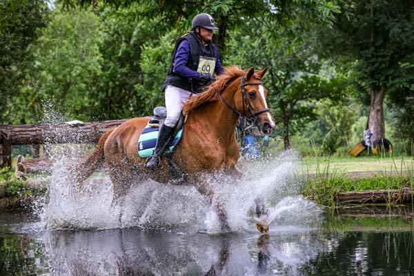 Cross country - equine eventing photo - horse running through water