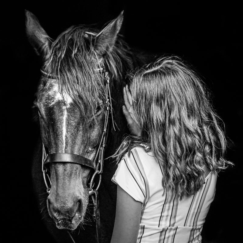 girl and horse black background grunge photo